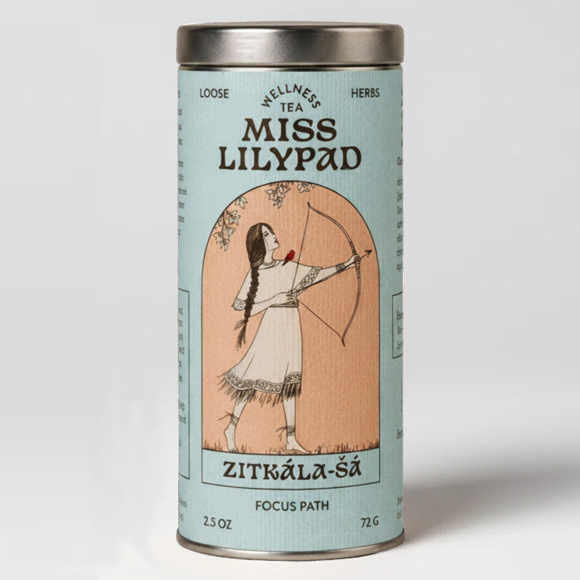 Miss Lilypad Focus Path Zitcala-sa loose herbal tea in a cylindrical tin canister with a blue label and silver metal lid and base. An illustration of a braided hair woman in an indigenous dress holding an a bow and arrow and a red bird resting on her shoulders