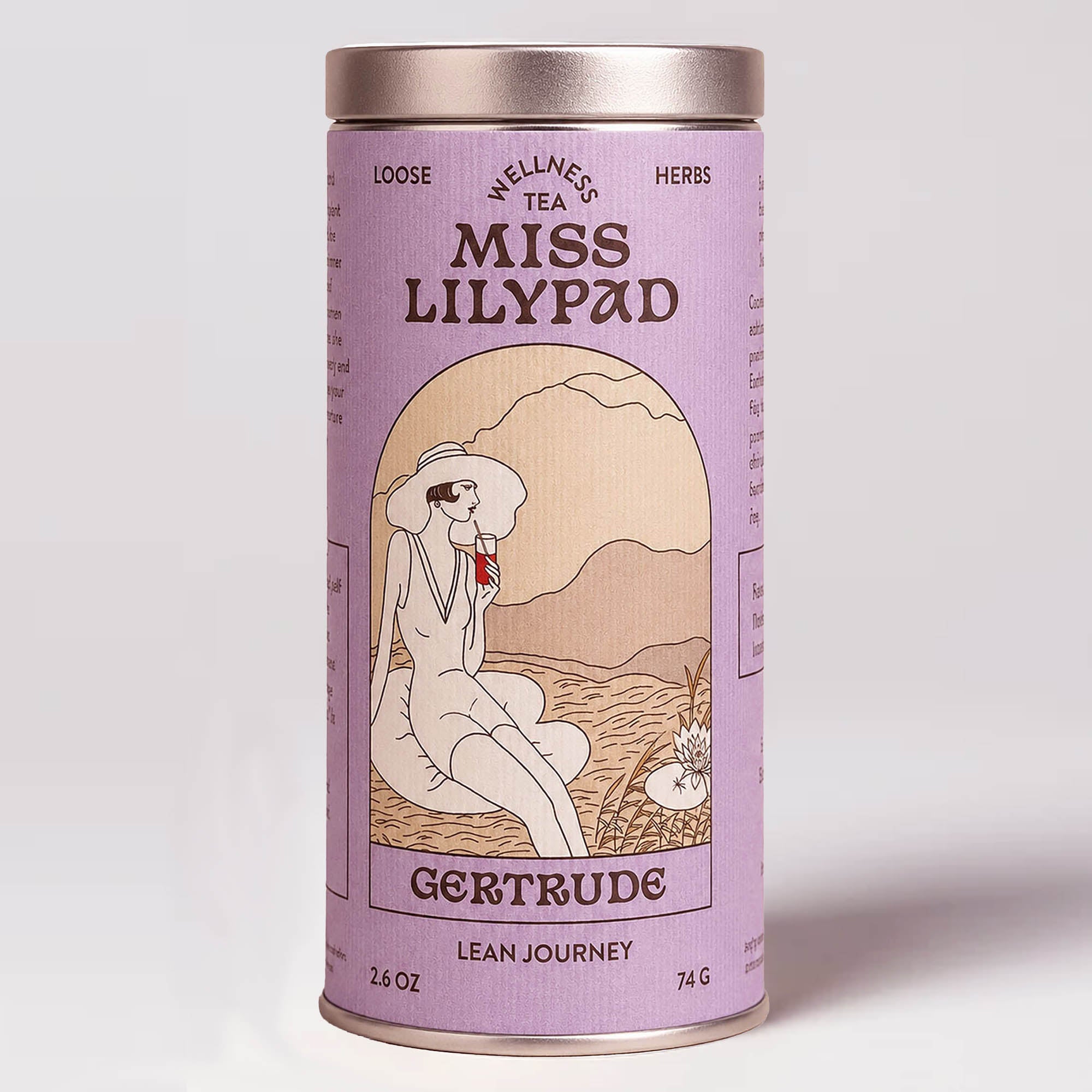 Miss Lilypad   Lean Journey Gertrude loose herbal tea in a cylindrical tin canister with a lavender label and silver metal lid and base. An illustration of a woman dressed in 1920 swimming suit and large sunhat sitting on top of a lily pad sipping a red tea