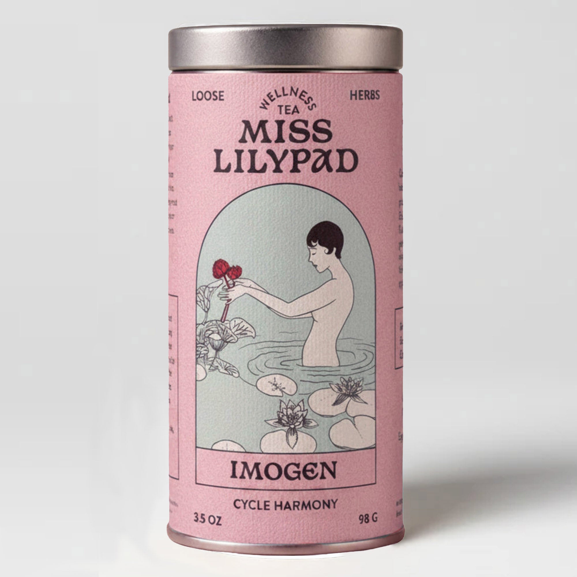 Miss Lilypad Cycle Harmony Imogen loose herbal tea in a cylindrical tin canister with a pink label and silver metal lid and base. An illustration of a woman inside lily pad pond holding two flowers